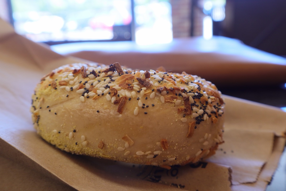 Close-up view of fresh toasted everything bagel