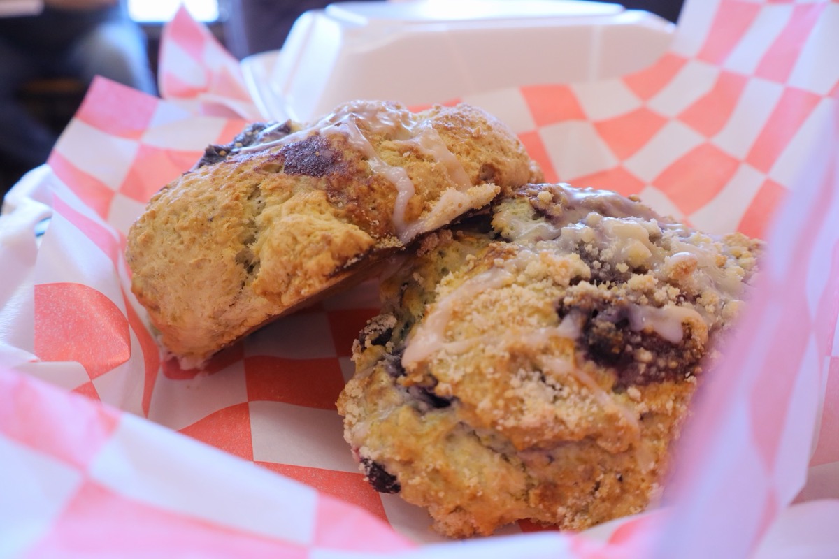 Freshly baked blueberry scones with sweet vanilla drizzle